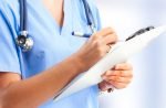 Nurse holding a clipboard